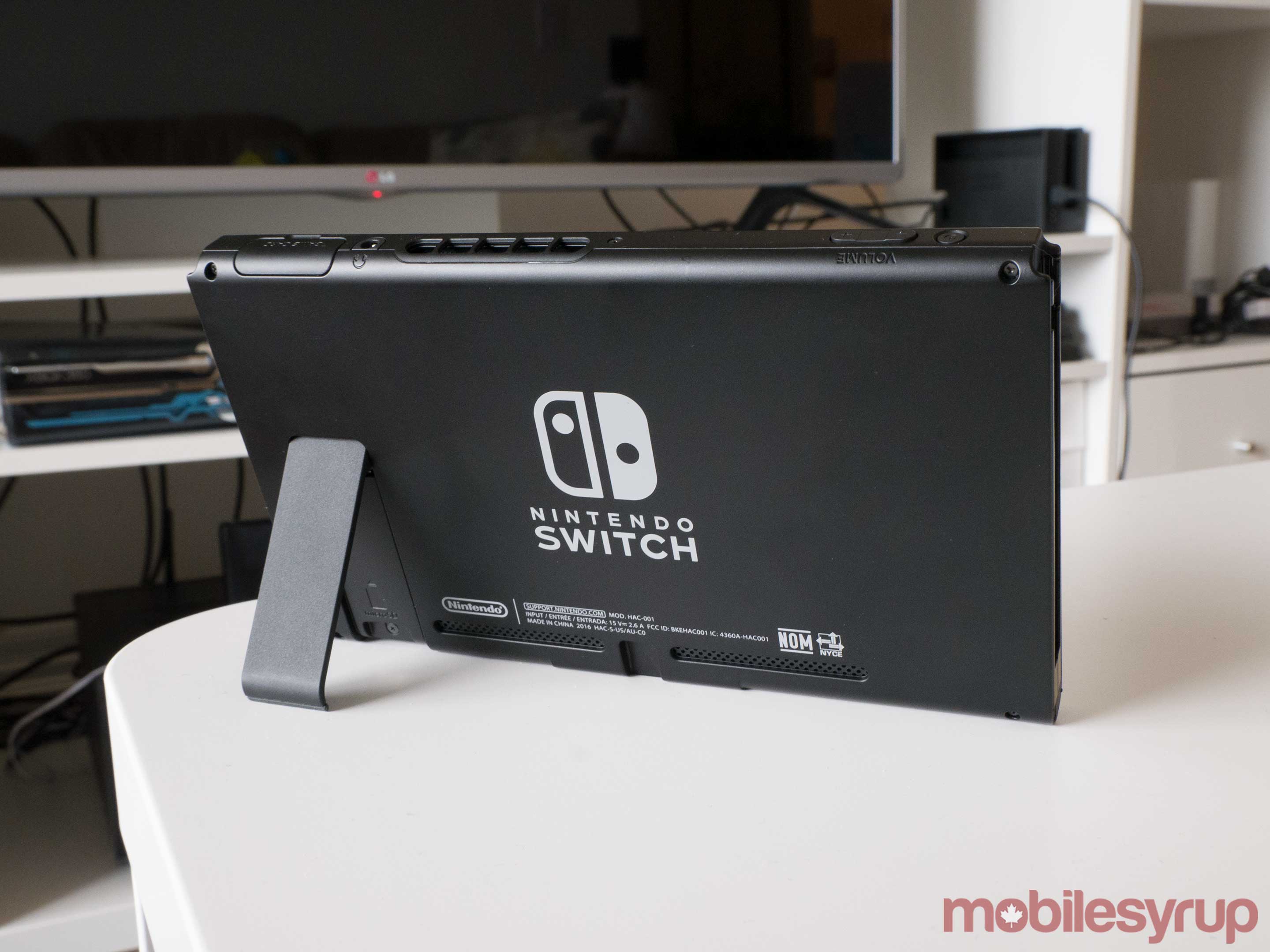 Nintendo Switch on table with kickstand