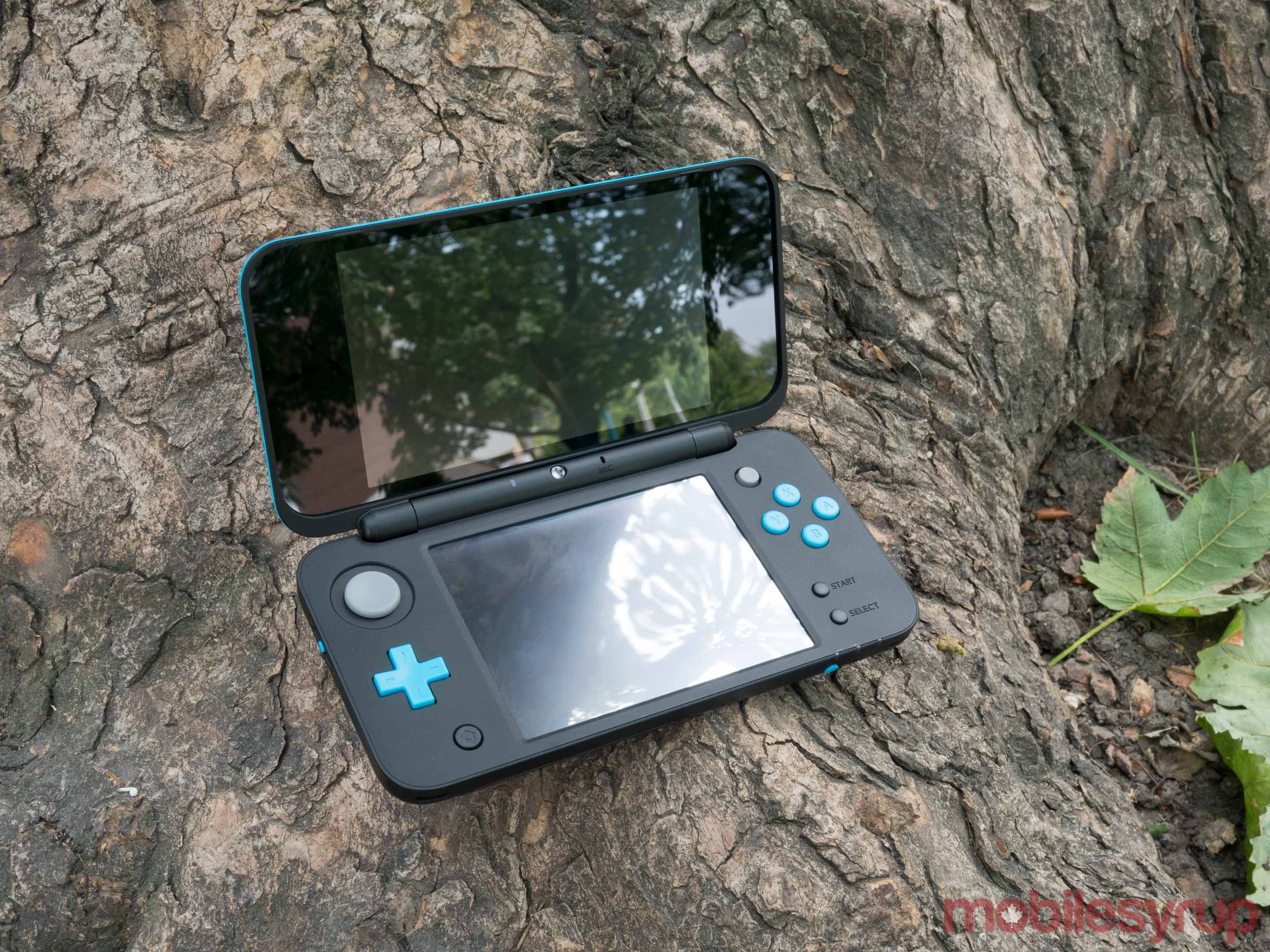 Nintendo 2DS XL on tree