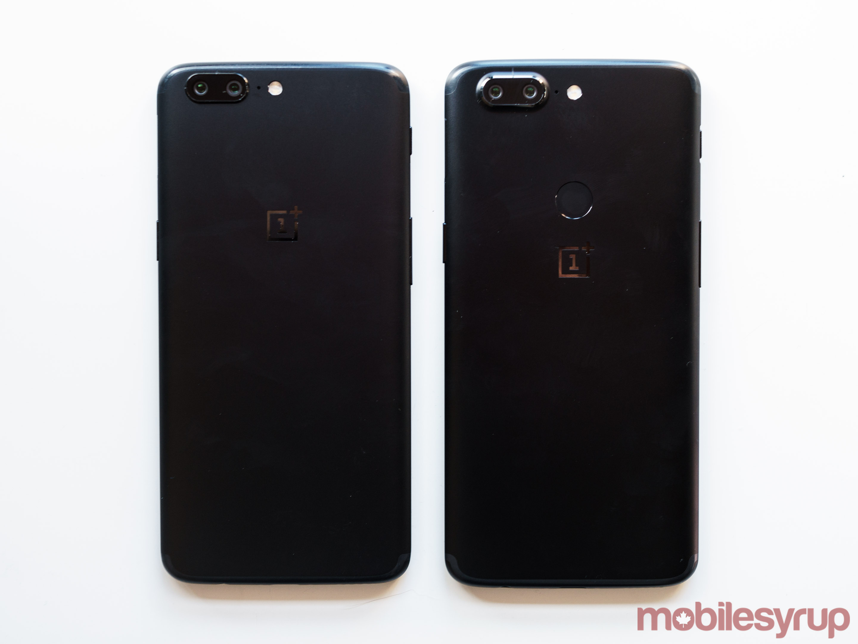 A comparison shot of the back of the two phones