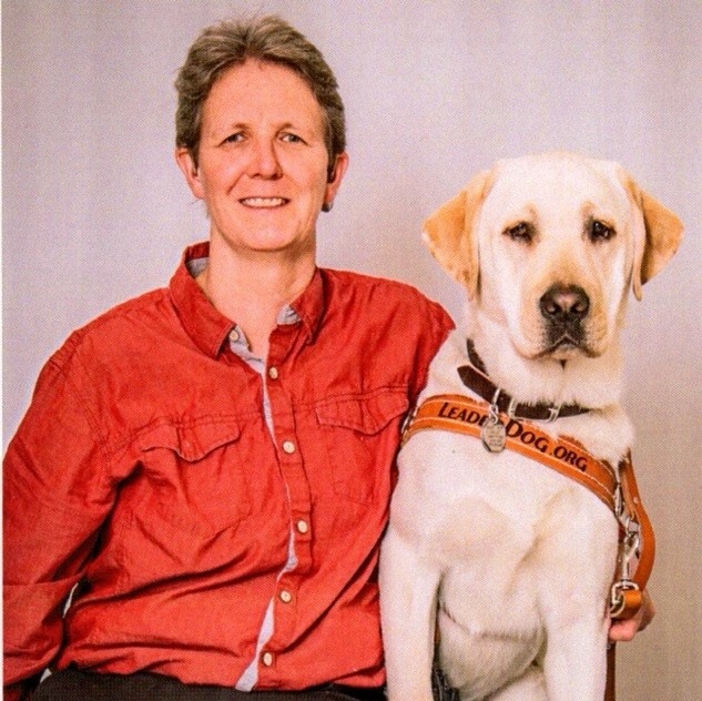 Megan McHugh and her guide dog Kajun