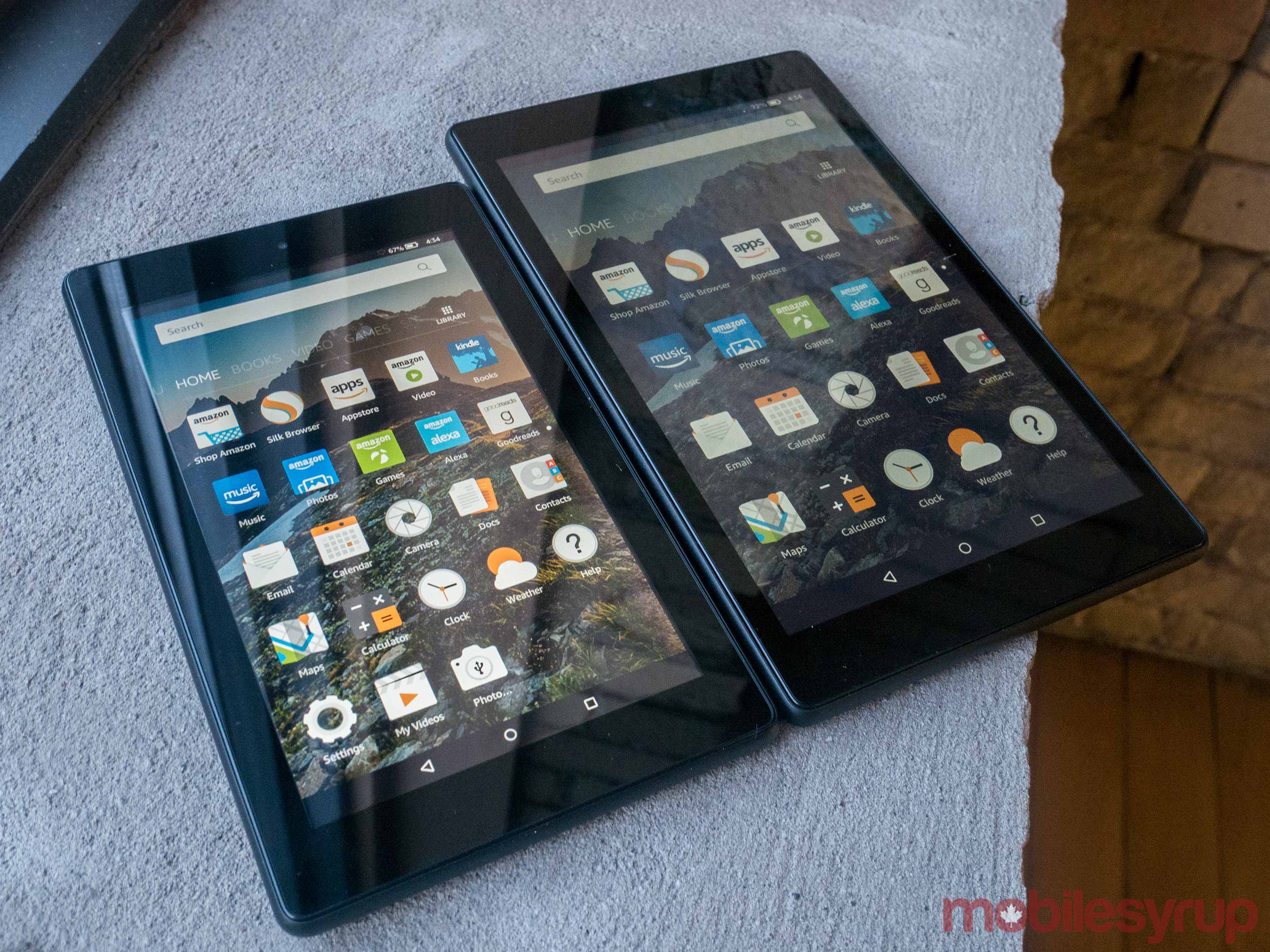 A seven-inch Amazon tablet next to an eight-inch Amazon tablet.