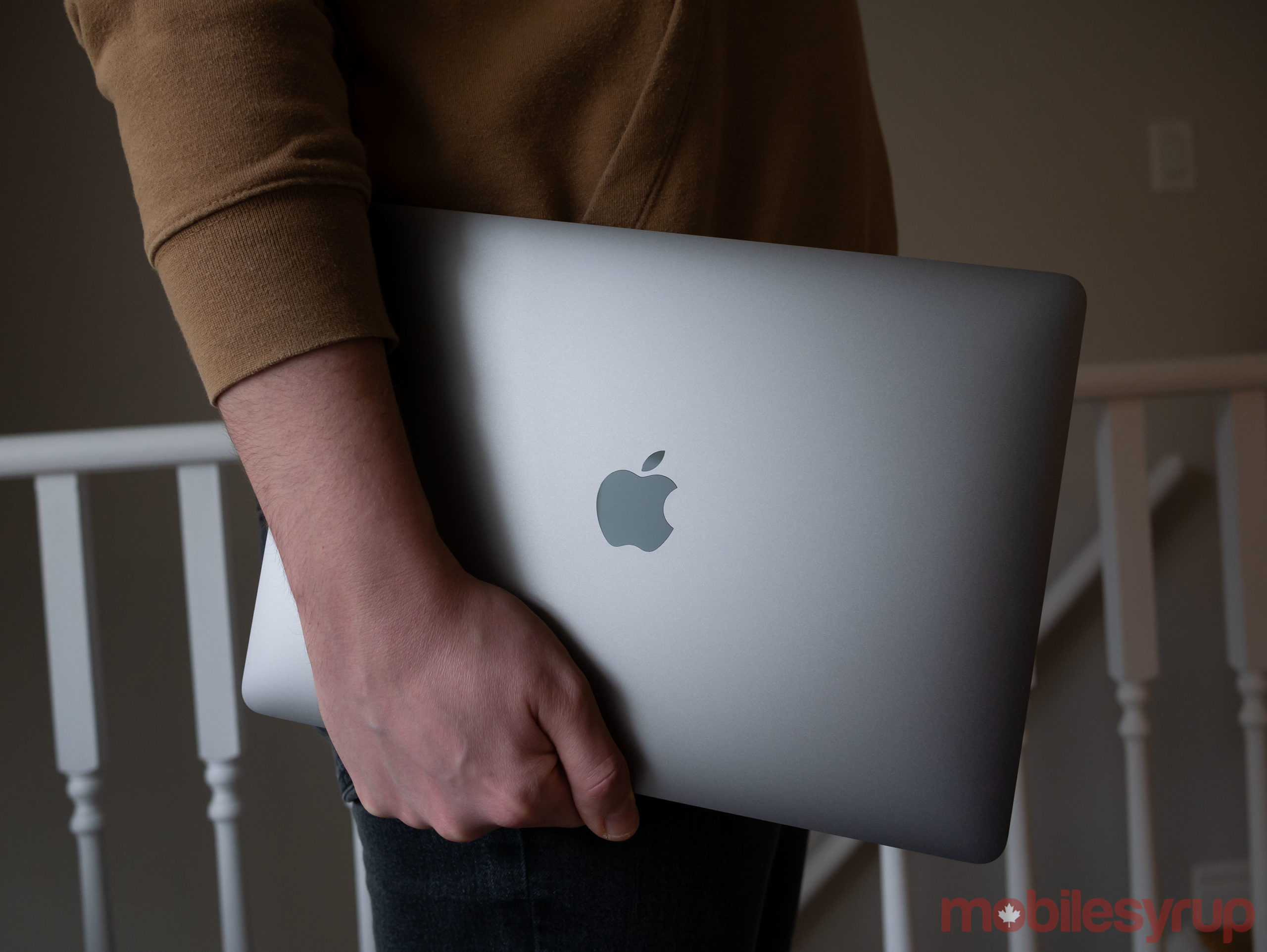 2020 MacBook Air in hand and closed