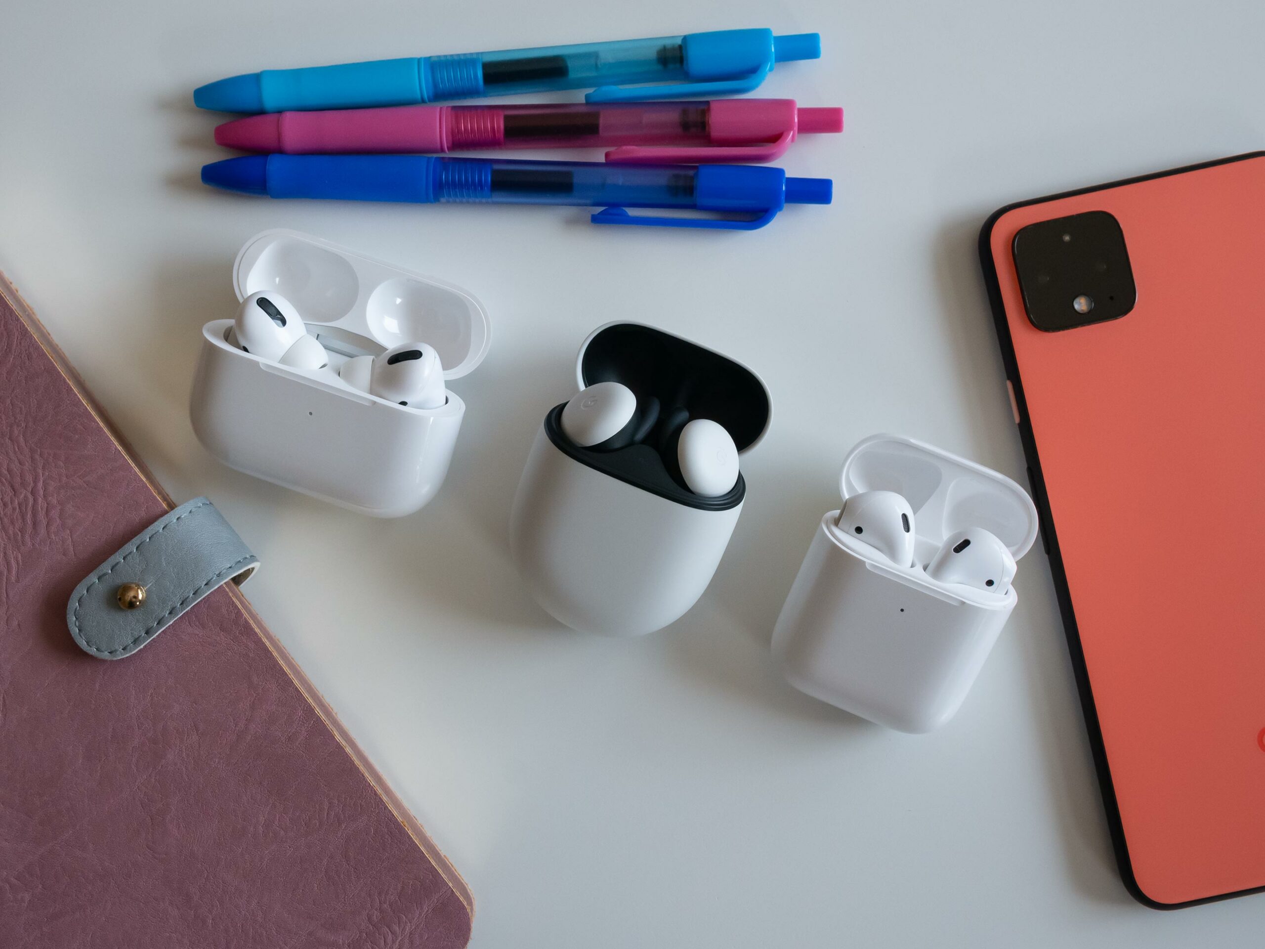 Pixel buds 2020 beside AirPods and AirPods Pro 