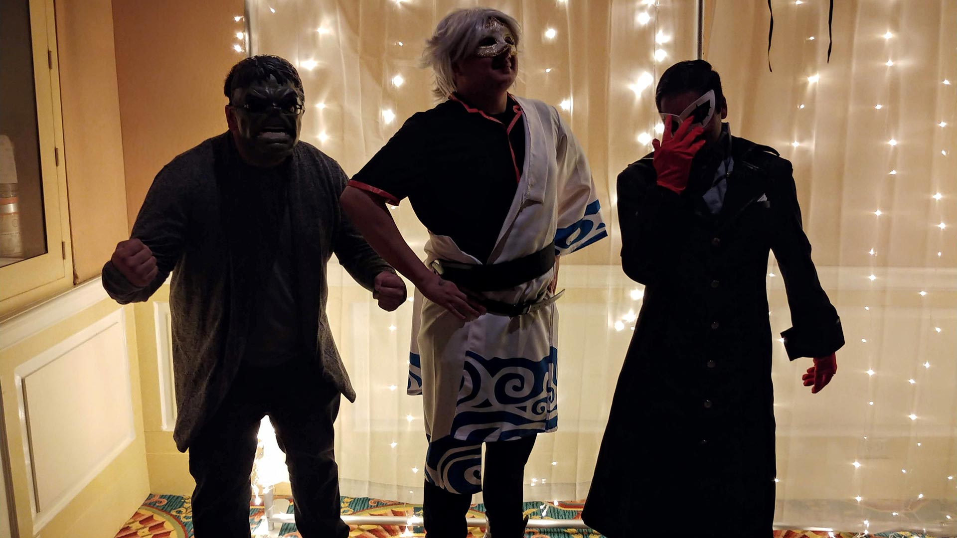 Three young males dressed as Smart Hulk from Avengers: Endgame, Gintoki from Gintama and Joker from Persona 5.